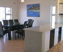 Granite kitchen and 8 seater dining - 11 Simbalina Beach Penthouse