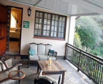 Hibiscus Suite Bathroom + Kitchen - Butterscotch Bed & Breakfast