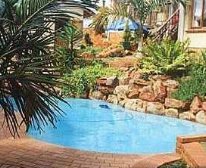 Sundowner Cottage - Summer Place Guest Cottages 