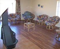 Living room with fire-place - KINMEL GUEST FARM & LODGE