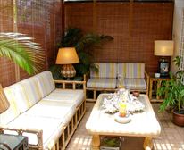 Private patio off room 3 - Manaar House B & B